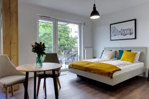 Posteľ alebo postele v izbe v ubytovaní Essence Apartments Sapphire