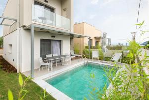 Bazén v ubytování Yuka Villas Collection nebo v jeho okolí