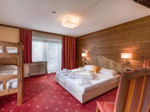 Postel nebo postele na pokoji v ubytování Hotel Restaurant Sidan