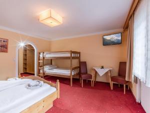 Postel nebo postele na pokoji v ubytování Hotel Restaurant Sidan