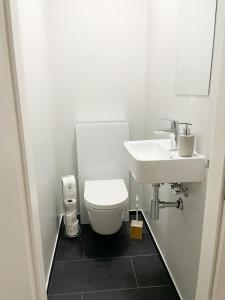 Ett badrum på PF Unterkunft