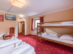 Postel nebo postele na pokoji v ubytování Hotel Restaurant Sidan
