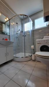 Kúpeľňa v ubytovaní Apartment Manus A + 28 fotografií