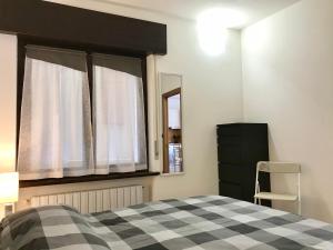 Posteľ alebo postele v izbe v ubytovaní Il Ciottolo Apartments