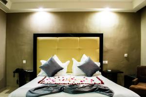 Postel nebo postele na pokoji v ubytování Tempoo Hotel Marrakech City Centre Adults Only