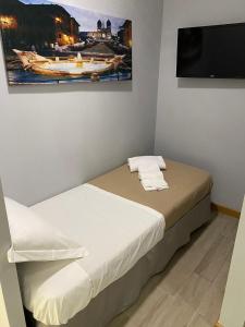 Postel nebo postele na pokoji v ubytování White albergo diffuso Ristorante & SPA