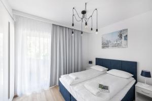 Posteľ alebo postele v izbe v ubytovaní ShortStayPoland Szwedzka (B47)