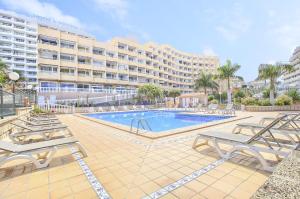 The swimming pool at or close to Studio with sea view in Borinquen