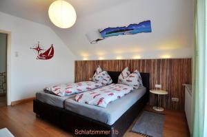 Säng eller sängar i ett rum på Accanto Appartement Ferienwohnung