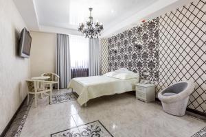 Posteľ alebo postele v izbe v ubytovaní Hotel Premier