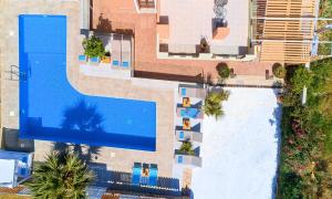 an overhead view of a swimming pool in a resort at Island Villa Heated Pool in Georgioupolis