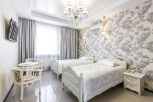 Posteľ alebo postele v izbe v ubytovaní Hotel Premier