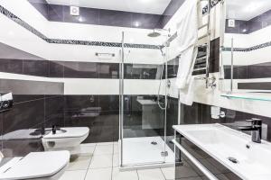 Kúpeľňa v ubytovaní Hotel Premier