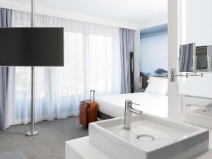 TV/Unterhaltungsangebot in der Unterkunft Novotel Charleroi Centre