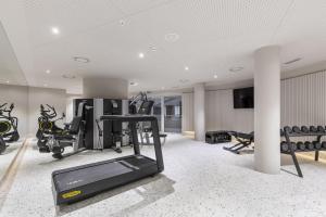 a fitness room with a gym with tread machines at NEXT - by Savoy Signature in Funchal