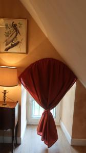 La Vieille Foulonnière : Chambres d'hôtes & Permaculture的休息区