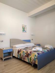 Postel nebo postele na pokoji v ubytování Il Negramaro