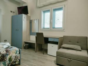 Postel nebo postele na pokoji v ubytování Il Negramaro