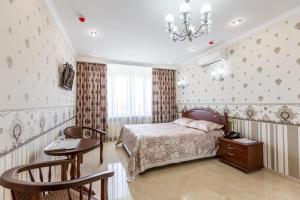 Posteľ alebo postele v izbe v ubytovaní Hotel Premier