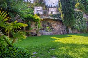 Κήπος έξω από το Hotel GHT Neptuno-Tossa & Venus SPA