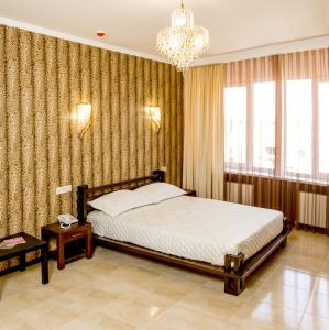 Posteľ alebo postele v izbe v ubytovaní Hotel Premier