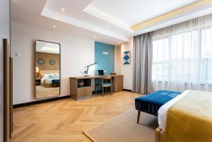 Postel nebo postele na pokoji v ubytování Ulwazi Place Hotel by Trianum + 37 fotografií
