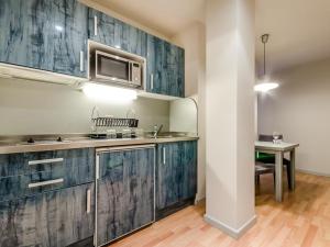 Kuchyň nebo kuchyňský kout v ubytování Hotel Nagusi