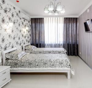 Posteľ alebo postele v izbe v ubytovaní Hotel Premier