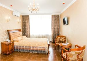 Posteľ alebo postele v izbe v ubytovaní Hotel Premier