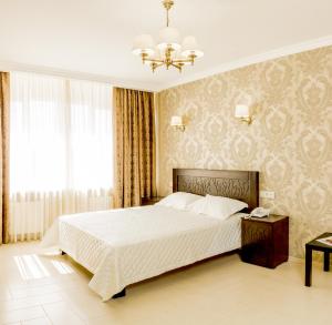 Posteľ alebo postele v izbe v ubytovaní Hotel Premier