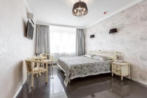 Posteľ alebo postele v izbe v ubytovaní Hotel Premier
