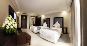 Postel nebo postele na pokoji v ubytování Tempoo Hotel Marrakech City Centre Adults Only