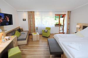 Postel nebo postele na pokoji v ubytování Hotel Waldlust