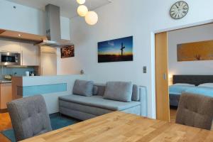 Kuchyň nebo kuchyňský kout v ubytování Das Sonnreich - Thermenhotel Loipersdorf