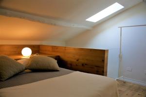 Posteľ alebo postele v izbe v ubytovaní 32 BnB Camerecaffè