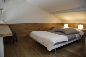 Posteľ alebo postele v izbe v ubytovaní 32 BnB Camerecaffè