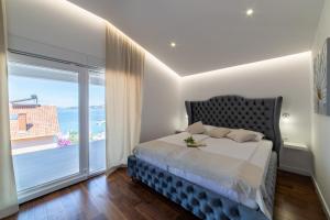 Posteľ alebo postele v izbe v ubytovaní Besker Apartment