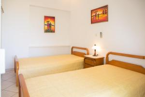 Postel nebo postele na pokoji v ubytování Sea Side Villa + 36 fotografií