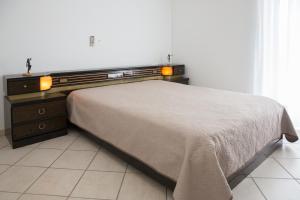 Postel nebo postele na pokoji v ubytování Sea Side Villa