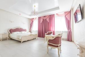 Posteľ alebo postele v izbe v ubytovaní Hotel Premier