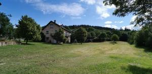 an old house in the middle of a field at Gite CLEVACANCES in Laval-du-Tarn