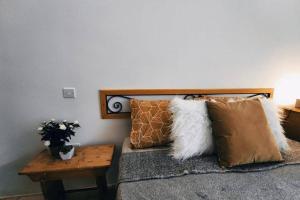 Un pat sau paturi într-o cameră la LA88 Bijou Boutique