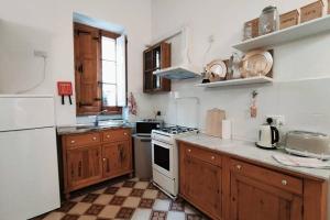 O bucătărie sau chicinetă la LA88 Bijou Boutique