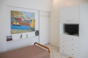 TV a/nebo společenská místnost v ubytování Sea Side Villa
