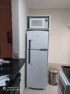 Η κουζίνα ή μικρή κουζίνα στο Flat Unique Moderno & Luxuoso