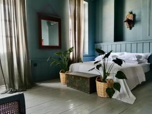 Postel nebo postele na pokoji v ubytování 1900 Hotel