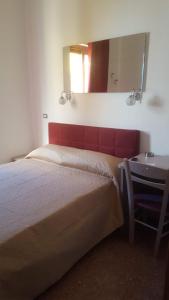 Postel nebo postele na pokoji v ubytování NUOVA AURORA Rent Rooms