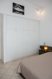 Postel nebo postele na pokoji v ubytování Sea Side Villa