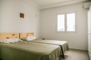 Postel nebo postele na pokoji v ubytování CoZi Coliving Djerba