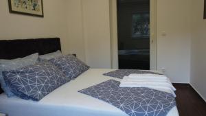 Posteľ alebo postele v izbe v ubytovaní Holiday Home Nugal Makarska 2+2